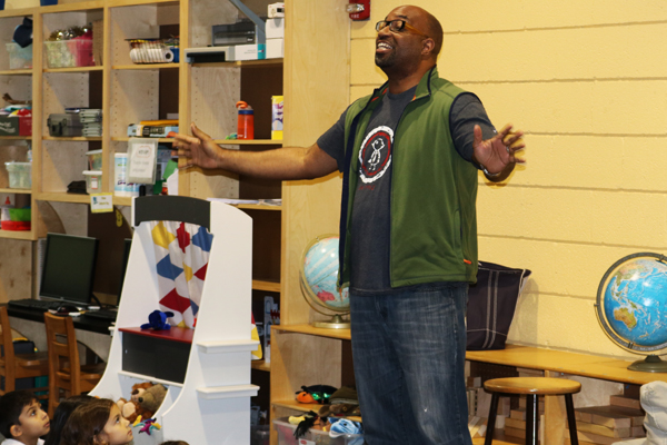 Author speaking to kids at a local school