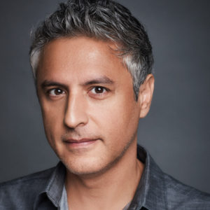 Headshot of author Reza Aslan